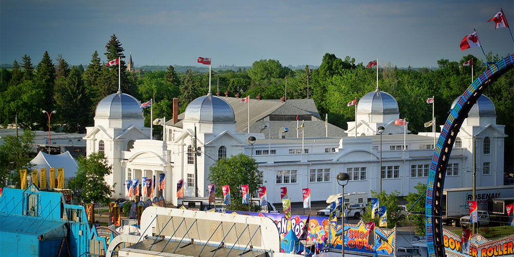 Aerial photo of the Provincial Exhibition of Manitoba's historic and restored Display Building No. II during the Manitoba Summer Fair.