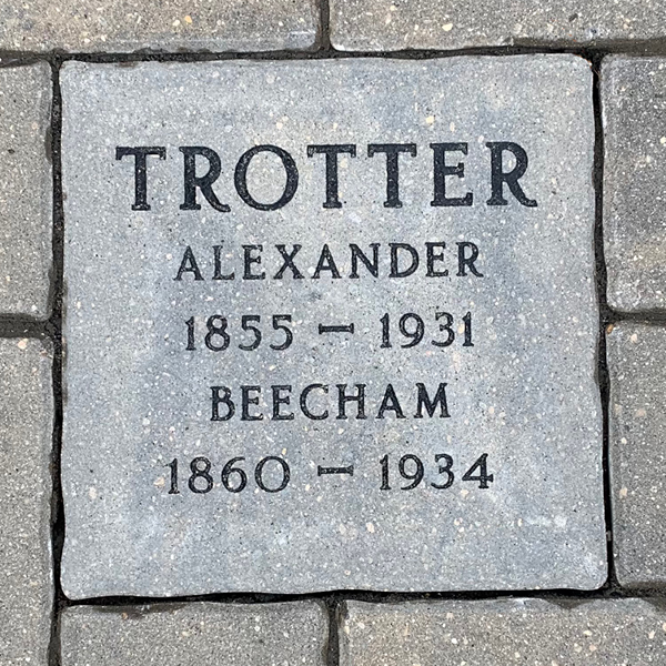 An image of a paving stone engraved with the name of a local family. The stones appear in the walkway at The Dome Building at the Provincial Exhibition of Manitoba.